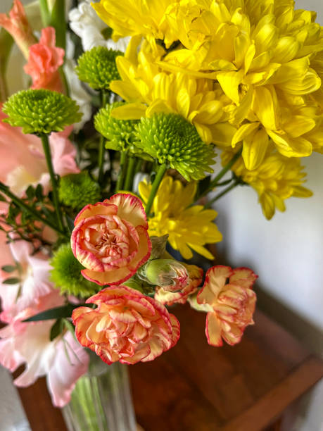 Flowers in a vase in domestic hallway