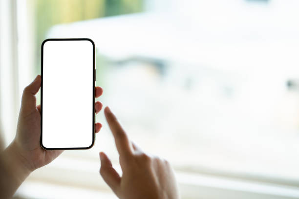 istock Blank mobile background, Hand holding white screen smart phone. 2164904334