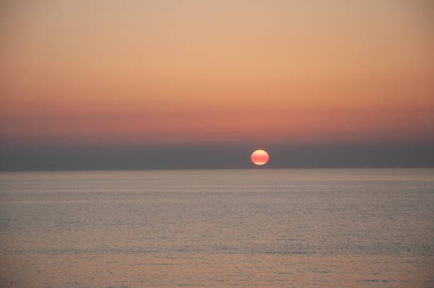 istock sunset in the north sea 2164908842