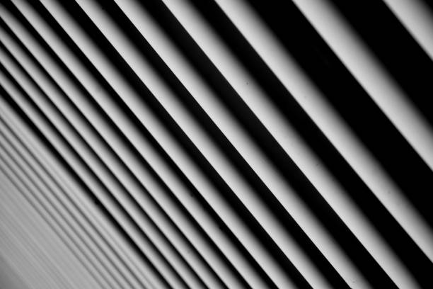 Abstract background of light and dark stripes. Textured. Advance.