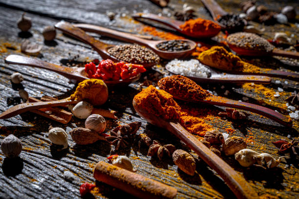 istock Aromatic Symphony: Spices and Herbs on Rustic Wooden Background 2164913545