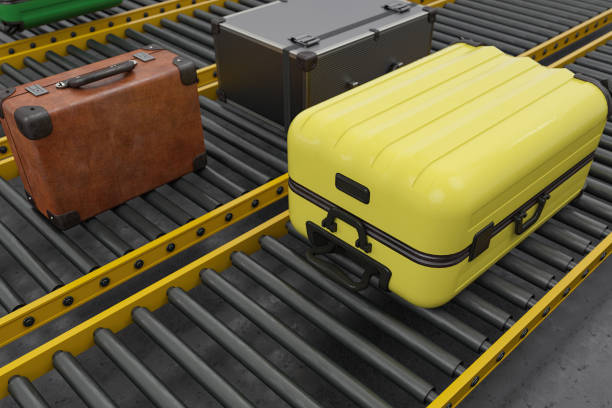 istock Luggages Moving On Airport Conveyor Belt 2164917069