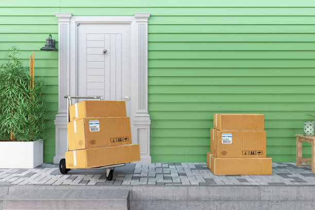 istock Cardboard Delivery Boxes on the Doorstep 2164917082