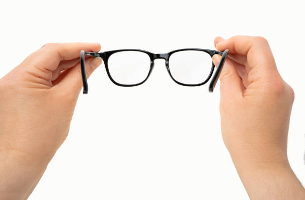 istock putting my eyeglasses 2164917288