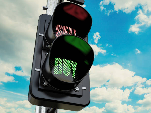 istock Traffic Lights with Sell and Buy Signs 2164917352