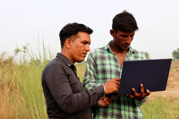istock Men using laptop outdoor in nature 2164926386