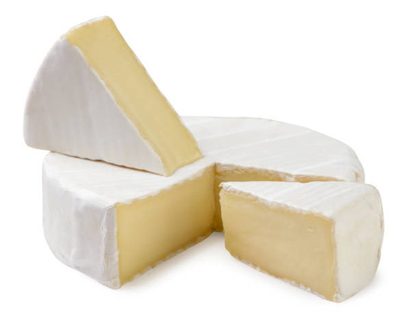 istock Camembert cheese and two pieces on a white background. Isolated 2164927135