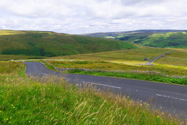 istock Light streaks on the road to Muker. 2164933311