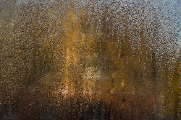 istock drops of water on glass 2164935074