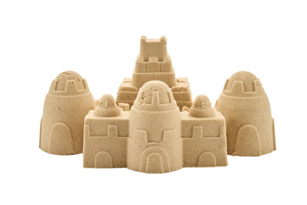 istock Sandcastle sculpture featuring various towers on a white background 2164935273