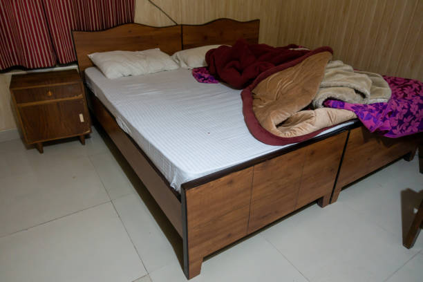 istock A morning bed with scattered sheets and covers in an Indian setting. 2164941654