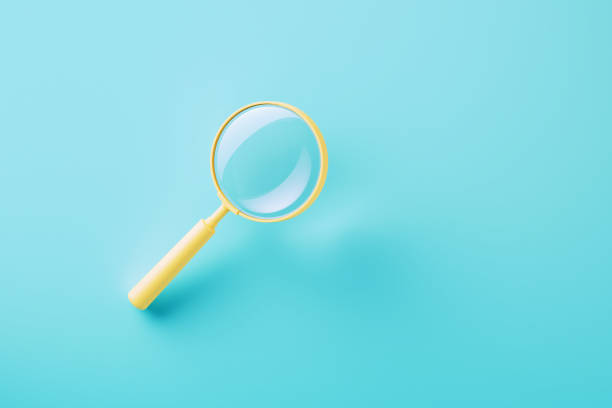 Yellow magnifier on blue background.
