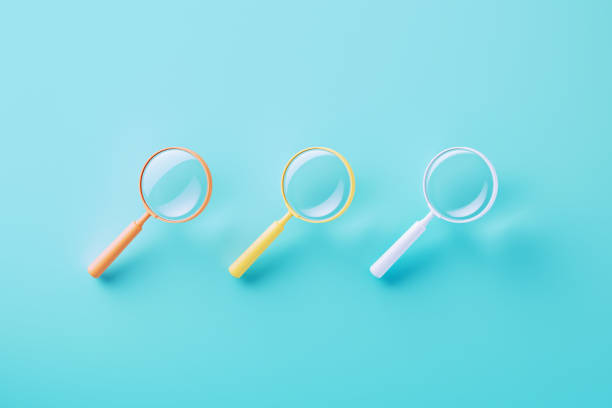 istock Colorful Magnifiers On Blue Background 2164942449