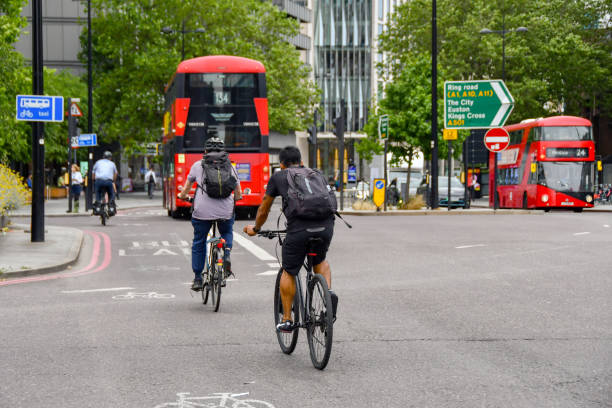London, England, UK - 27 June 2023: People cycling to work in central London