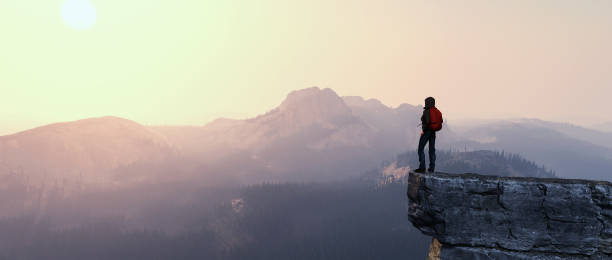 istock Hiker on top of a mountain. 2164946495