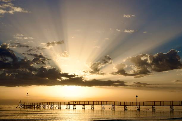 istock Sunrise at the sea with pier background 2164946700