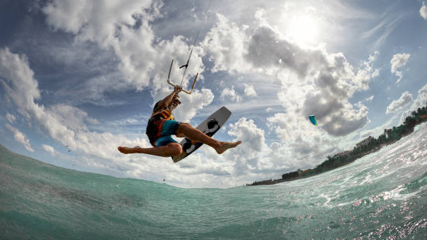 istock Kite surfer jumps with kiteboard in transition 2164948852