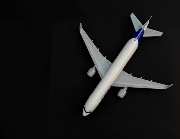 istock Diecast airplane model on black background high angle view. 2164951599