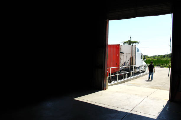 Commercial truck parked at warehouse gate