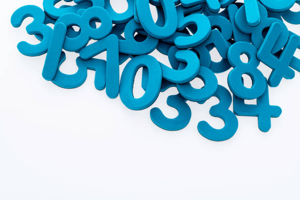 Heap of foam numbers on white background.