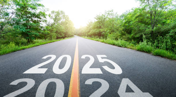 istock New year number 2024 and 2025 on empty asphalt road 2164953695
