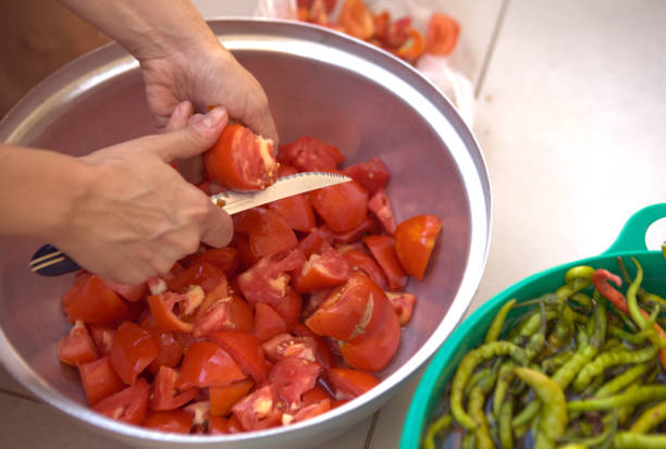 istock The woman making tomato paste at home. 2164973591