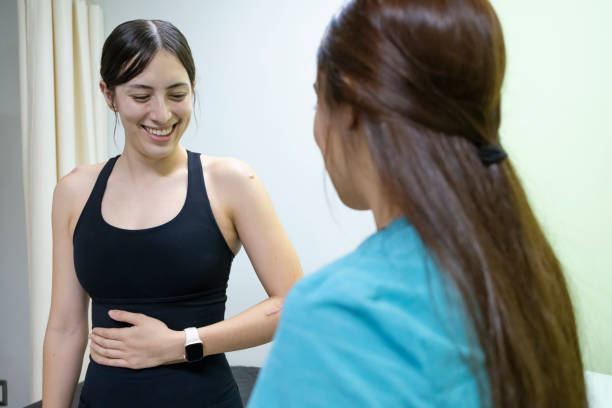 istock Patient doing the exercises set by her therapist. 2164982543
