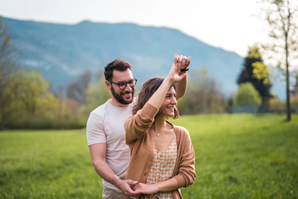 istock Joyful Dance Outdoors with Diverse Couple 2164983287