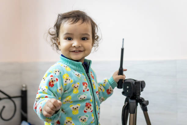 smiling kid innocent facial expression at indoor at night