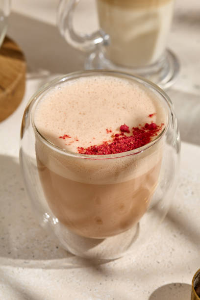 istock Raf Coffee with Raspberries - Trendy Dual-Walled Glass Beverage on Light Background 2165006741