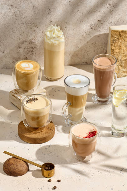 Assortment of Hot Coffee Beverages on Rustic Surface.