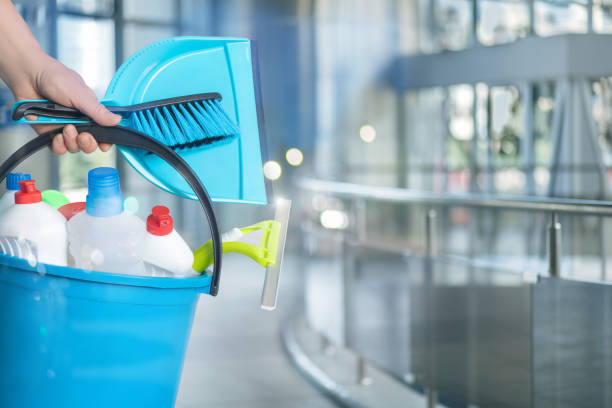 istock Cleaning Lady with Cleaning Products on a Blurred Background. 2165007800