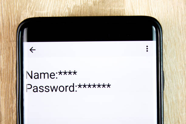 istock Username and password on the smartphone screen on the table. Entered username and password on your smartphone. 2165014117