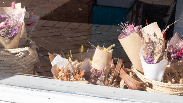 istock Dried flowers in a window display ready for sale. 2165014252