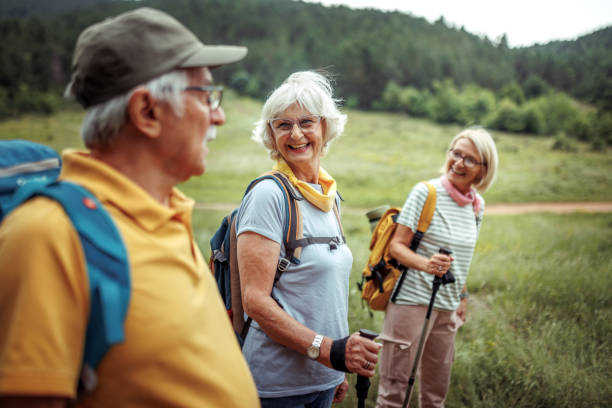 istock Senior hikers enjoying their day at forest 2165018223