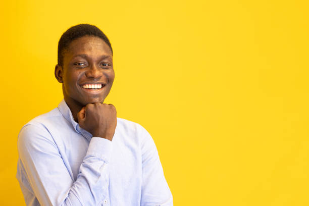 istock Young man on the yellow background 2165021757