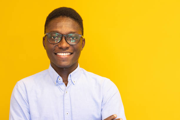 istock Young man on the yellow background 2165022797