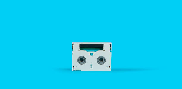 istock old white mini DV cassette on a blue surface against blue background 2165025315
