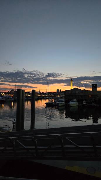 istock Sunset on Provincetown Harbor (Vertical) 2165037225