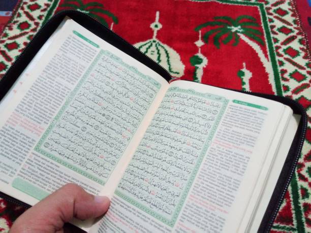 istock Al-Quran and prayer mat 2165038903