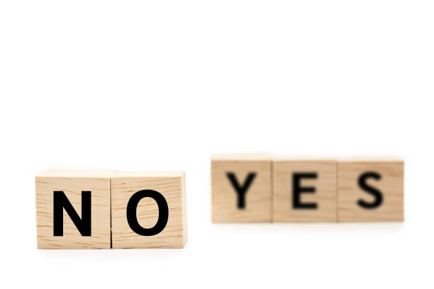 istock Wooden blocks with NO and YES wording. 2165047528