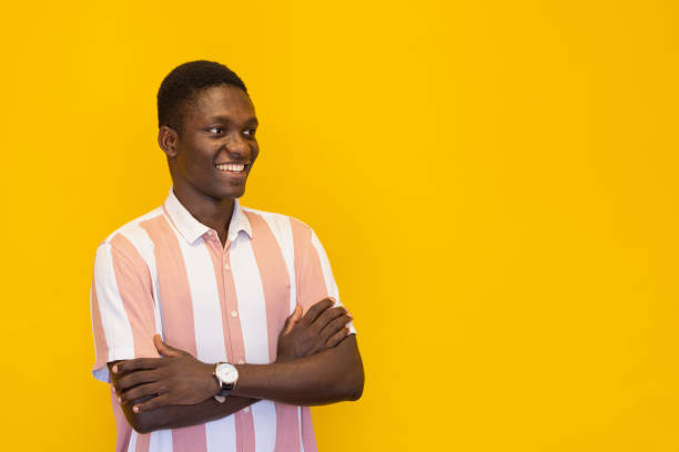 istock Young man on the yellow background 2165048588