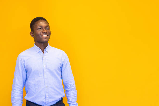 istock Young man on the yellow background 2165052977