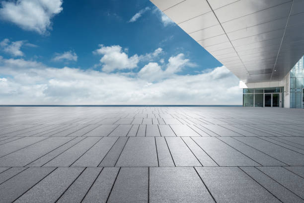istock Empty pavement and modern building in city. 2165053942