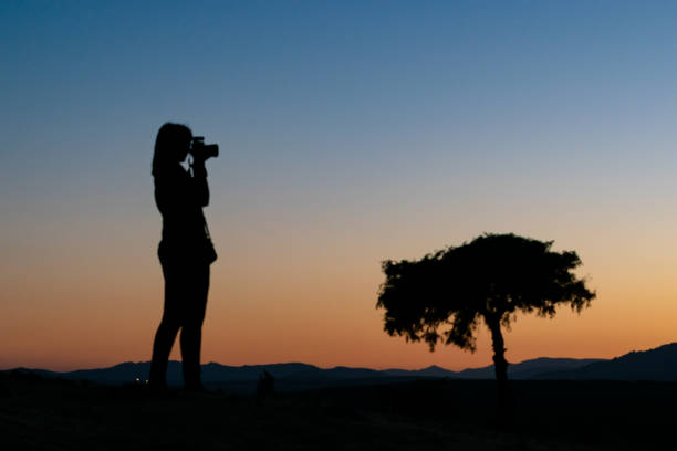 istock Woman taking a picture 2165054308