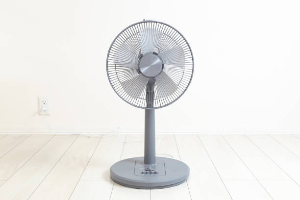 istock Electric fan in a white room 2165055165