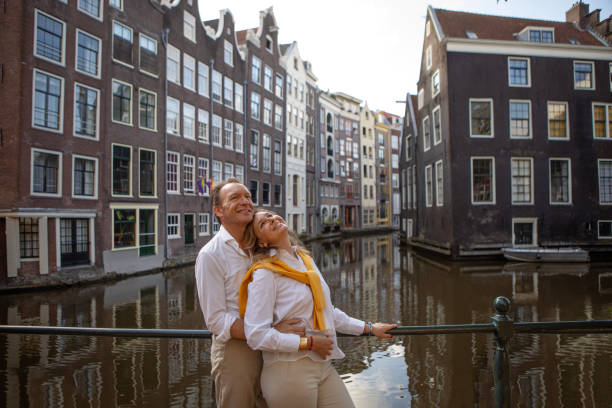 istock A middle aged couple sightseeing in Amsterdam 2165055819