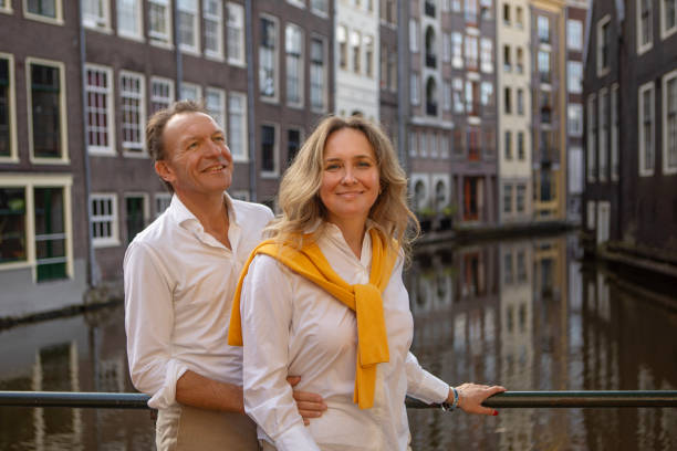 istock A middle aged couple sightseeing in Amsterdam 2165055831