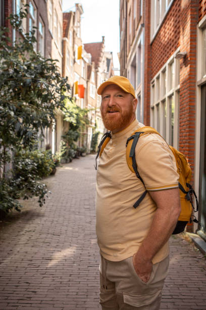 istock A middle aged man sightseeing in Amsterdam 2165056767