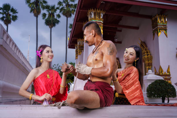 Asia woman in Thai dress traditional . Portrait women in traditional clothingl in Ayutthaya Thailand